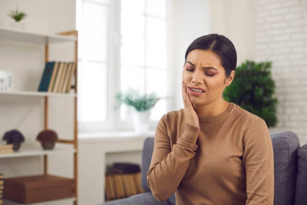 Woman,Has,A,Severe,Toothache.,Upset,Young,Lady,Touching,Cheek