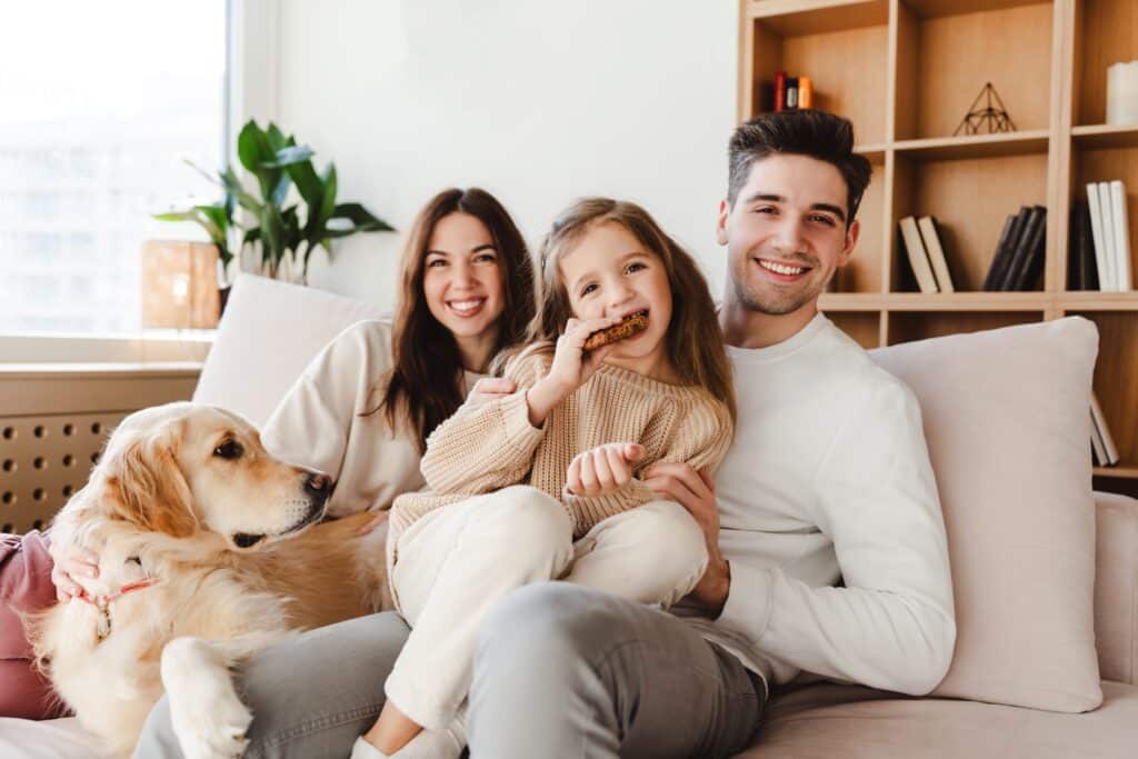 Beautiful,Smiling,Family,,Happy,Mother,,Father,And,Cute,Daughter,Eating